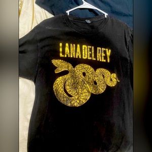 Lana Del Rey Concert T-Shirt Black with metallic gold print 
Size Lrg (Men’s)